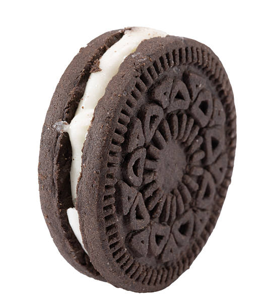 istock chocolate cookie with white cream filling isolated on a white background 2222225046