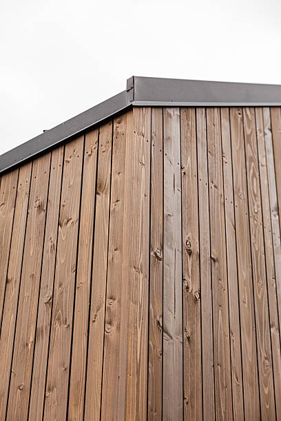 istock Vertical Wooden Facade of Modern Home Corner 2222225175