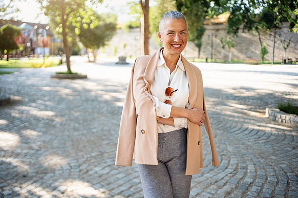 istock Confident stylish woman posing outdoors on a sunny day 2222229425