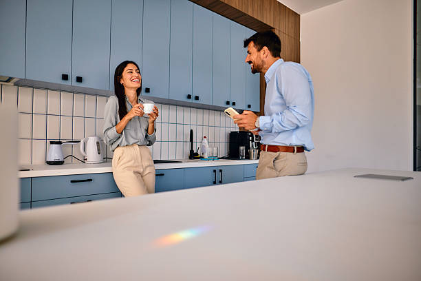 istock Business colleagues enjoying a coffee break and chatting in the office kitchen 2222232246