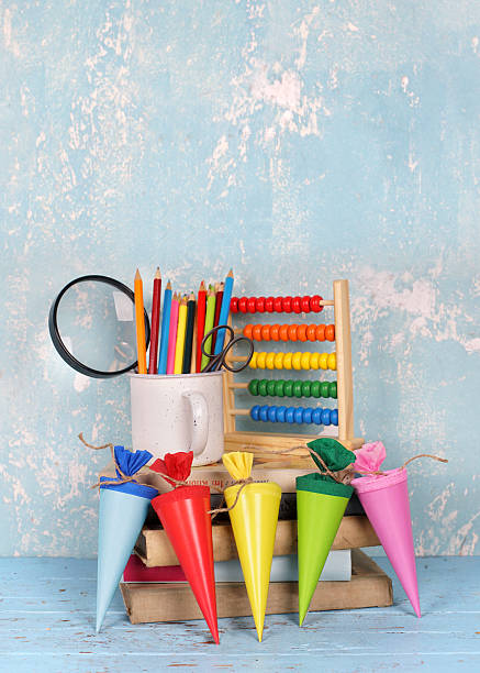 istock colorful school cones and some important school items for first day at school 2222235493