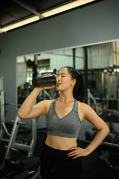istock Fit Woman Drinking Protein Shake After Workout 2222236457