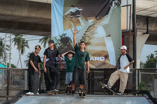 Young Asian skate boys getting ready for the upcoming skateboard competition