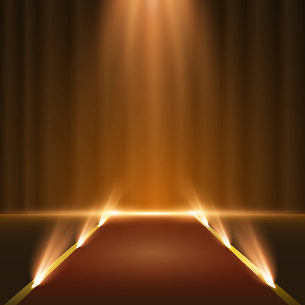 istock Red carpet leading to golden podium under spotlights. Glowing sparkles and dark dramatic background. Elegant festive setup for VIP events, success, or glamorous scenes. 2222248195