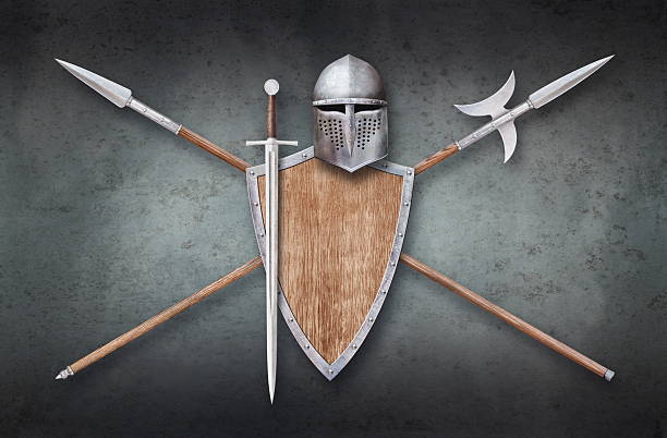istock helmet shield sword and two crossed lances on grunge background 2222249637