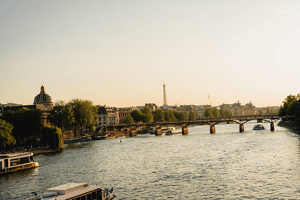 istock A scenic river with boats and a bridge elegantly in the background 2222249804