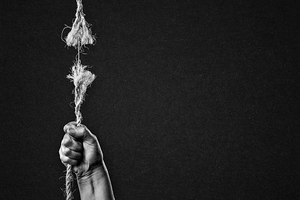 istock Hold on to Frayed Rope About to Break 2222250647