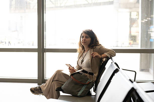 istock Woman waiting for a flight 2222256467