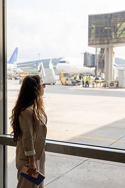 istock Woman waiting for a flight 2222256806