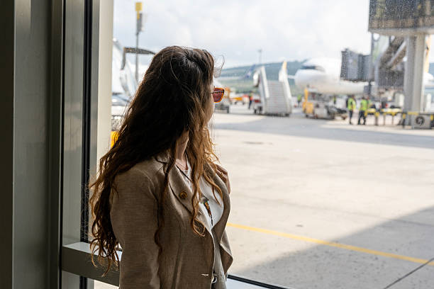 istock Woman waiting for a flight 2222256816