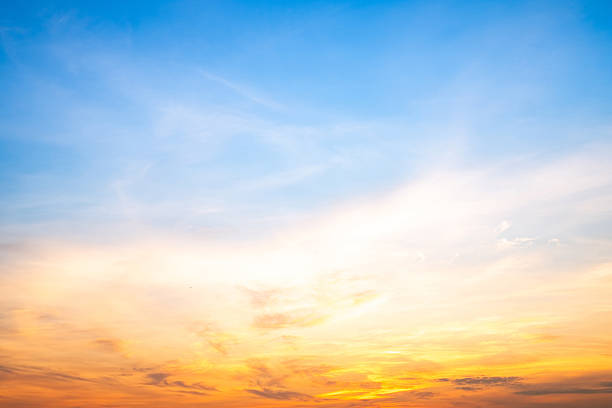 istock Beautiful , luxury soft gradient orange gold clouds and sunlight on the blue sky perfect for the background, take in evening,Twilight, Large size, high definition landscape photo 2222256927