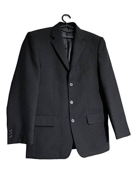 istock Black man's jacket on hanger isolated on white background. Three buttons classic blazer with pockets and turn down collar. Outerwear, costume, clothes, apparel, fashion, style, design, shopping. 2222257474