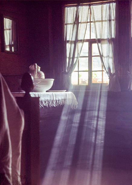 Sunlight Through Window in a Traditional Swiss Barn Interior