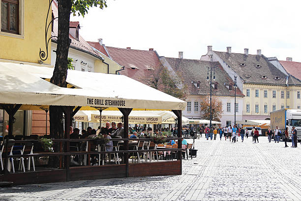 Sibiu, Romania - September 29 2019: Sibiu Main Square and Old Town with Restaurant Terraces, Romania