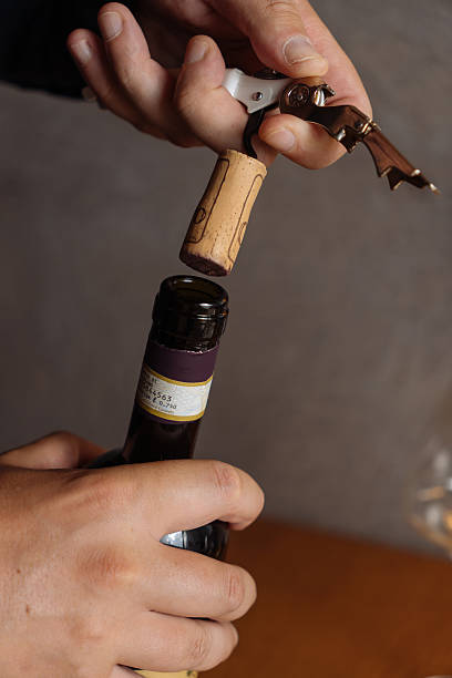 istock Opening a bottle of wine 2222267560