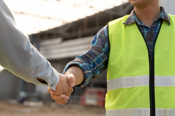 istock Construction team hands shaking greeting start up plan new project contract in office center at construction site, industry ,architecture, partner, teamwork, agreement, property, contacts. 2222275057