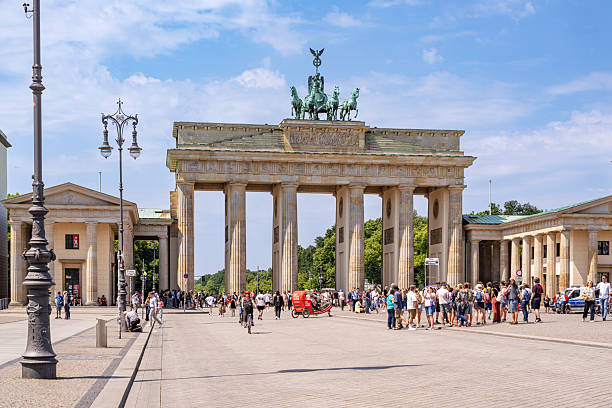 istock Brandenburg Gate in Berlin Surrounded by Tourists on a Sunny Day 2222277171