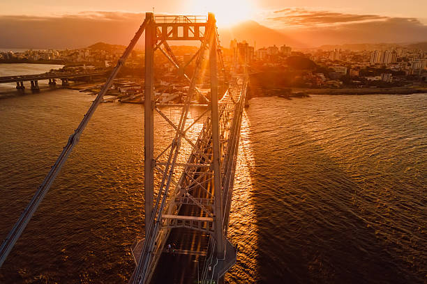 Hercilio luz cable stayed bridge with sunset sky in Florianopolis, Brazil. Above view
