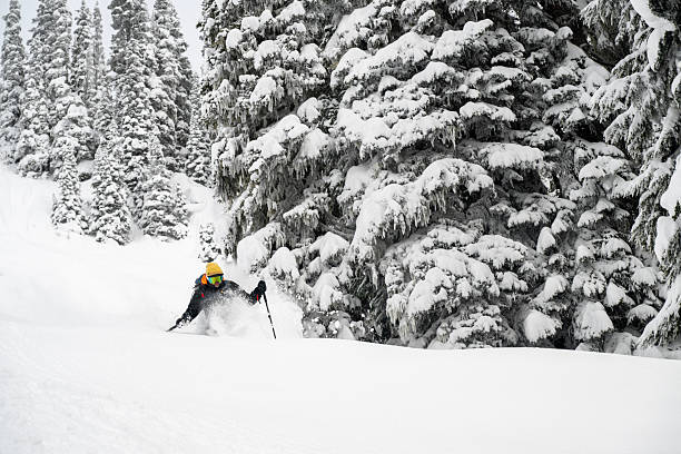 istock Ski mountaineer ascends snowcapped mountain 2222283013