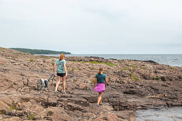 istock Two Sisters Exploring Shore of Lake Superior 2222283302