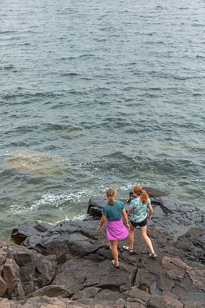 istock Two Sisters Exploring Shore of Lake Superior 2222283551