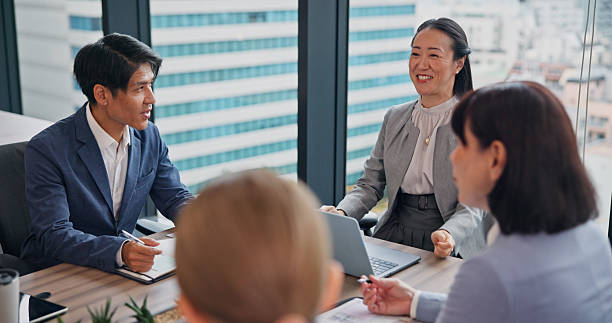 istock Business, people and happy office for teamwork, collaboration and discussion for project in Japan. Employees, boardroom and conversation with feedback, report and update in meeting as accountant 2222284257