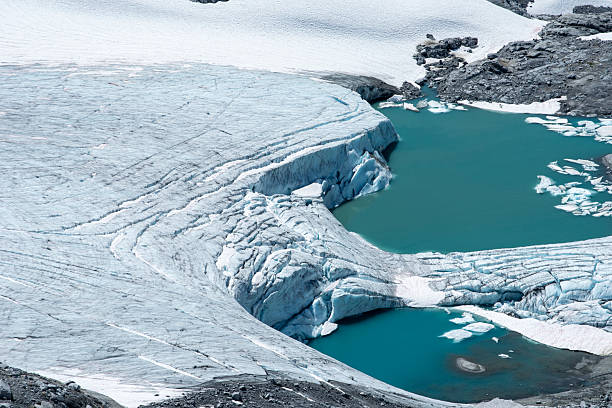 Raised view of glacier, with crevasses and lagoon, Garibaldi Park, British Columbia