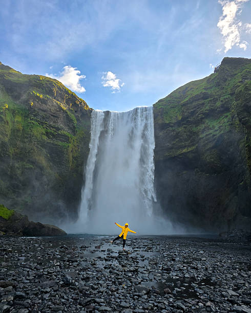 istock Adventure at Skogafoss Waterfall in Iceland under a bright blue sky 2222291172