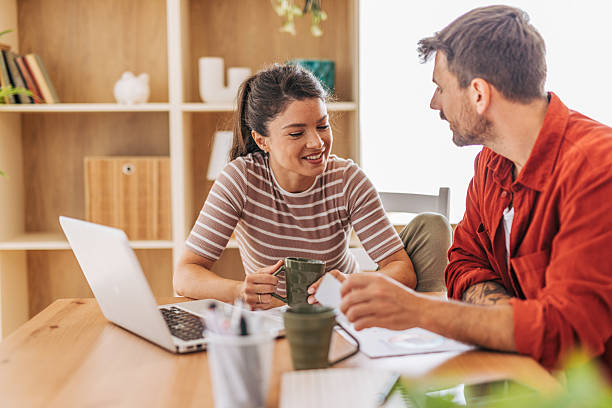 istock Young couple working from home are discussing business strategy 2222294442