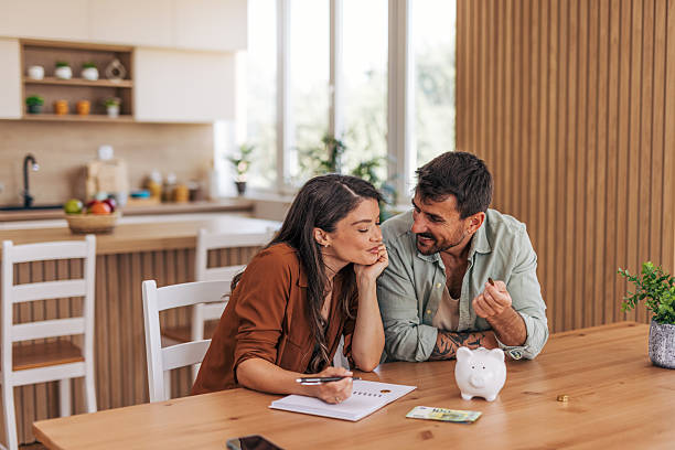 Couple doing finances and budgeting at home
