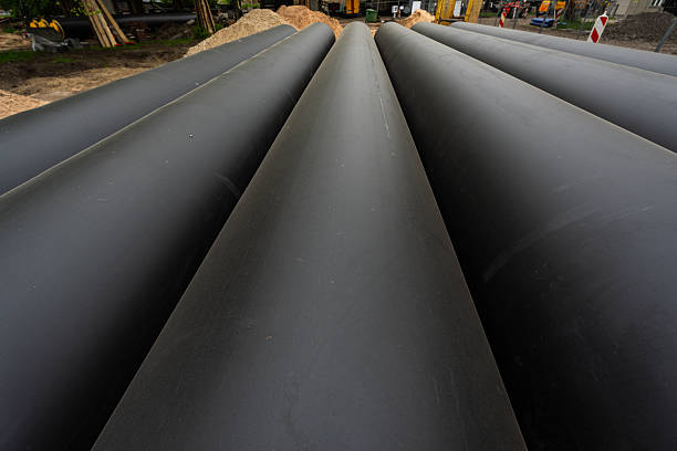 Pipes were placed at the side of the street in Riga for repairs