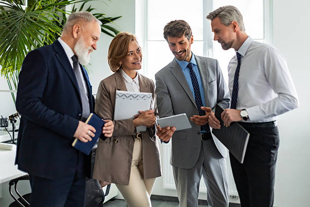 istock Business team discussing together business plans in office. 2222303270