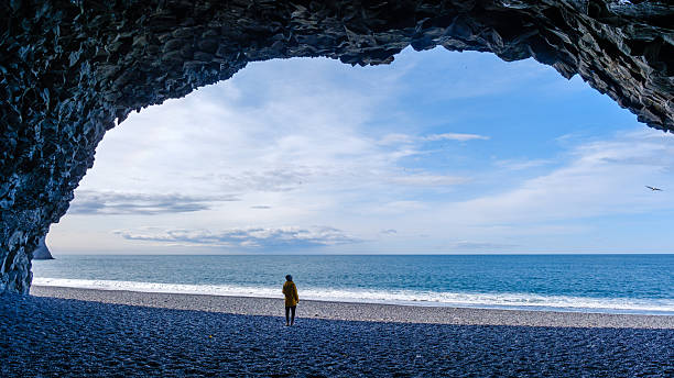 istock Explore the mystical Reynisfjara Beach with stunning rock formations and vibrant ocean waves 2222304619