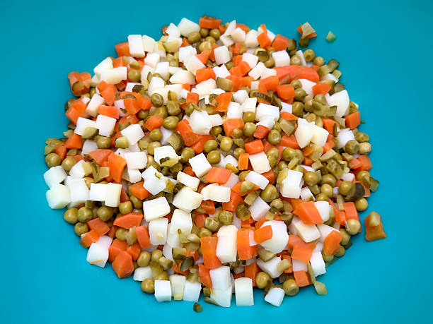 Green pea, sliced carrots and sliced potatoes for preparing garnish. Garnish for preparing appetizer. Turkish name Amerikan salatası