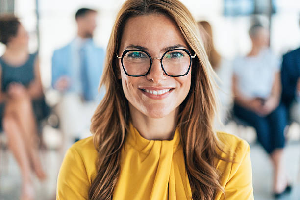 istock Confident businesswoman and her team 2222307203