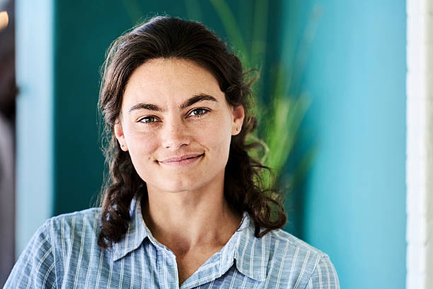 istock Charming young female wearing striped shirt 2222313730