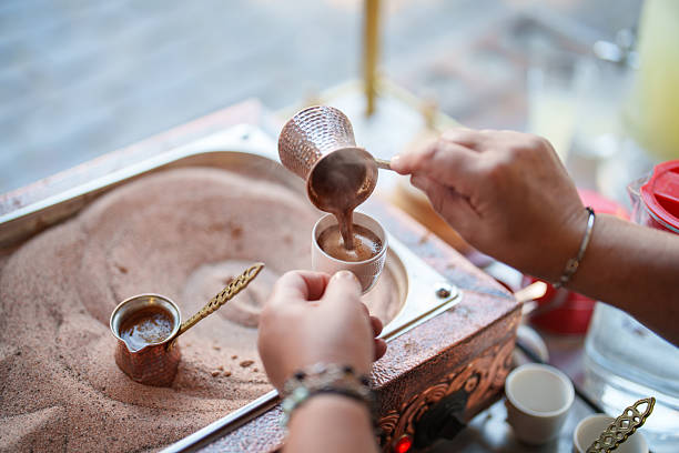istock Pouring Turkish Coffee from Cezve Roasted in Hot Sand 2222323349
