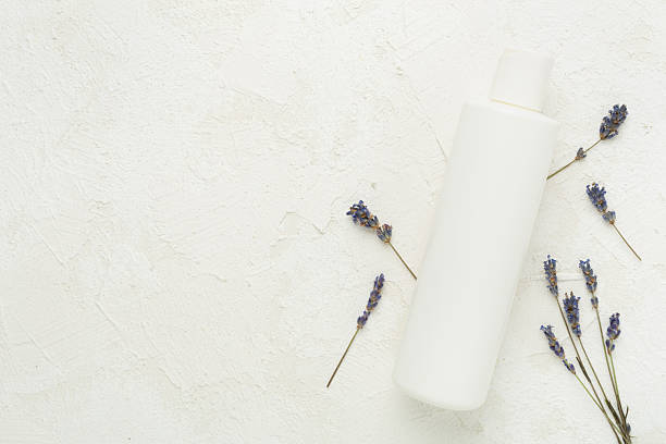 istock Cream with lavender extract on concrete background,, top view 2222324010