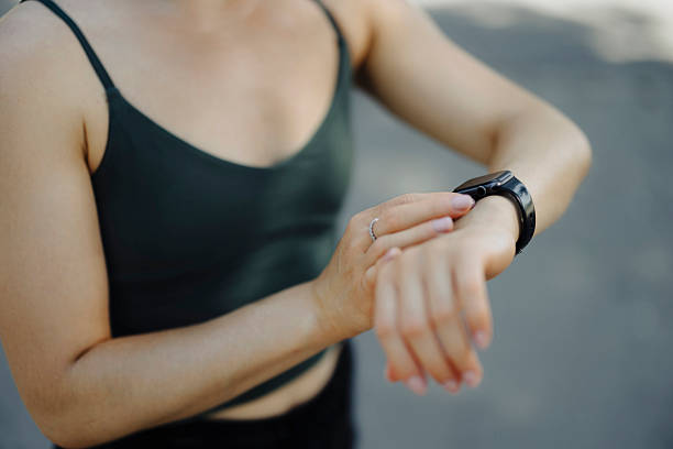 istock Athlete woman runner checking smart watch 2222325027