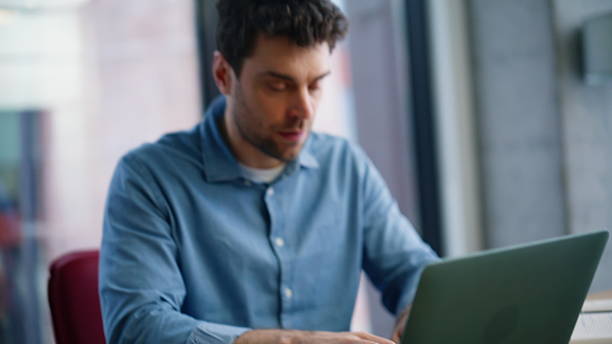 istock Emotional manager rejoicing success looking laptop screen at workplace closeup. 2222330690