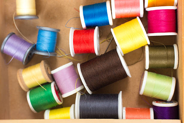 Spools of Colorful, Vibrant Thread in Sewing Box