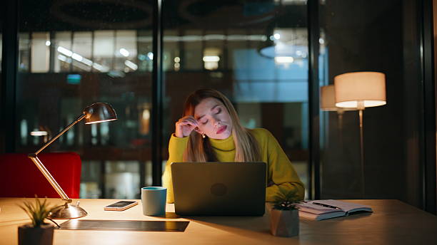 istock Overloaded executive looking solutions working late evening office. Tired woman 2222333766