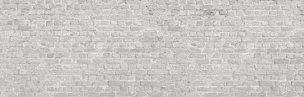 istock White brick wall forming textured background with light gray mortar 2222343583
