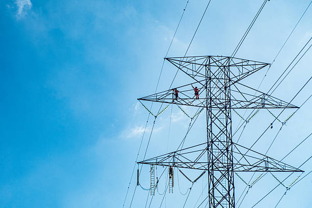 Electricians working on a Electrical Transmission Towers