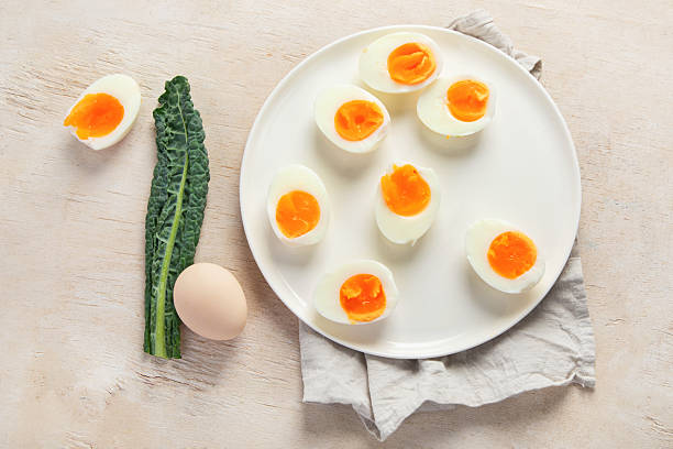 istock Plate with halves of delicious boiled eggs. 2222365635