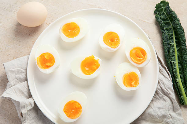 istock Plate with halves of delicious boiled eggs. 2222365815
