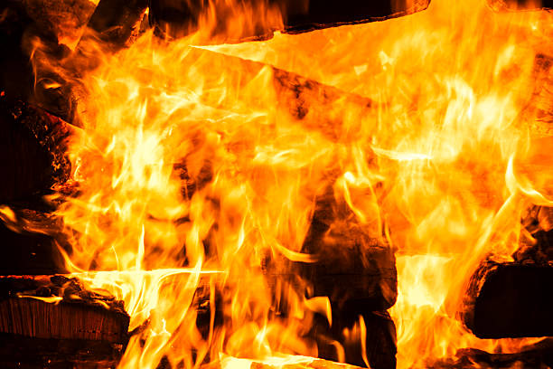 istock Narrow focus of a crackling bonfire at night 2222367328