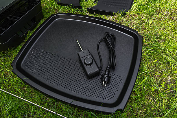 Assembling a new grill on the plot, installing an electric grill, hotplate, thermostat, power cable, barbecue