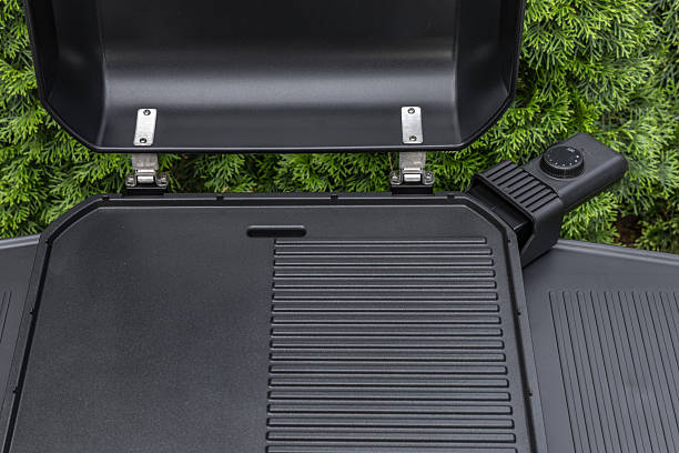 Assembling a new grill on the plot, installing an electric grill, hotplate, thermostat, power cable, barbecue