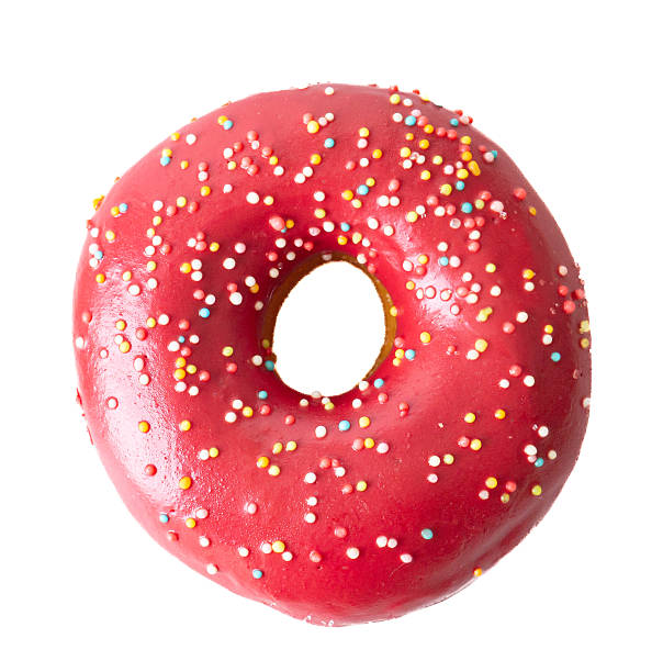 istock Donuts with colorful icing glazed designs isolated on a white background. 2222373607